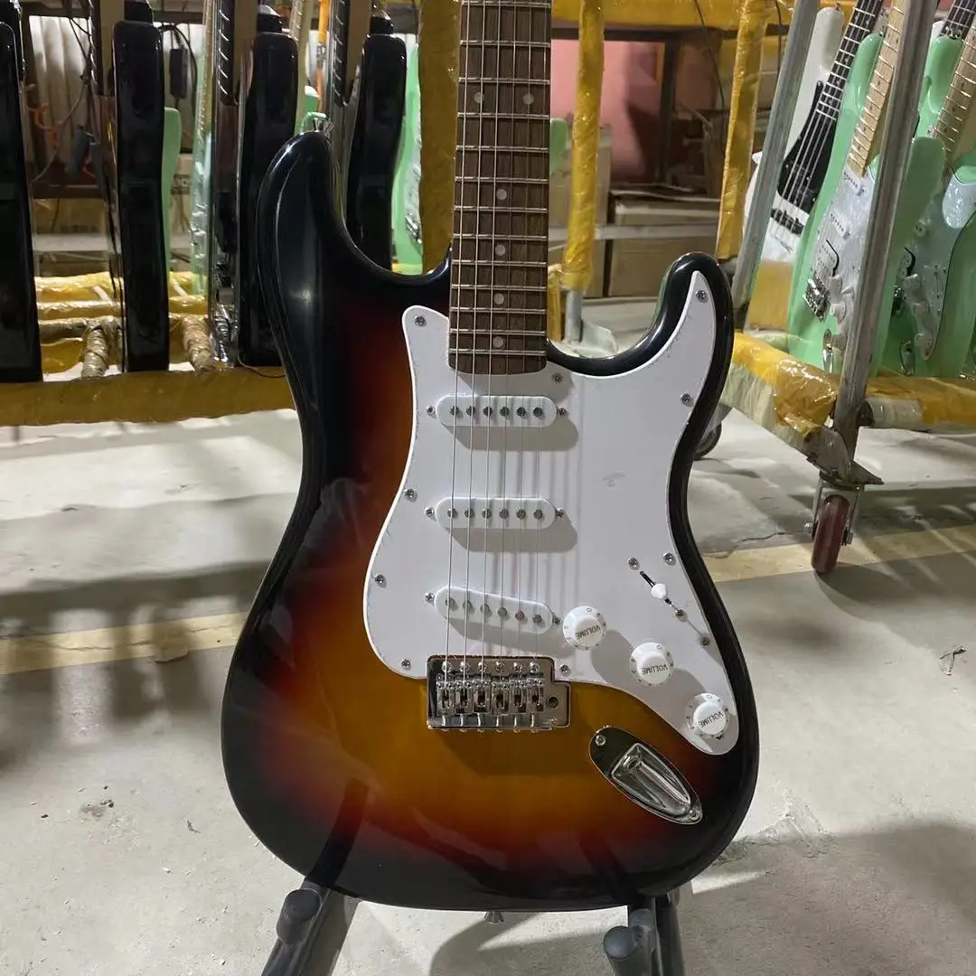 ST Electric Guitar Vintage Sunburst Color Rosewood Fingerboard White Pickguard High Quality Guitarar Free Shipping
ST Electric Guitar Vintage Sunburst Color Rosewood Fingerboard White Pickguard High Quality Guitarar Free Shipping