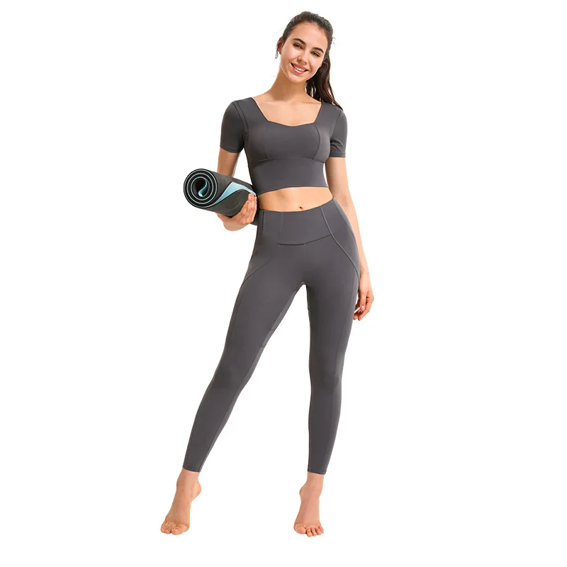 Sports yoga pants women's tight-fitting slim stitching stitching hip-lifting high-waist nude training fitness trousers 
Sports yoga pants women's tight-fitting slim stitching stitching hip-lifting high-waist nude training fitness trousers