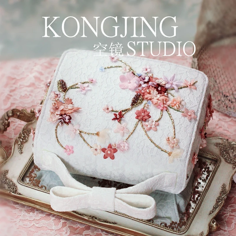 designs a new heavy nail bead embroidered flower white pearl hand-held bow stiletto women's bag
designs a new heavy nail bead embroidered flower white pearl hand-held bow stiletto women's bag
