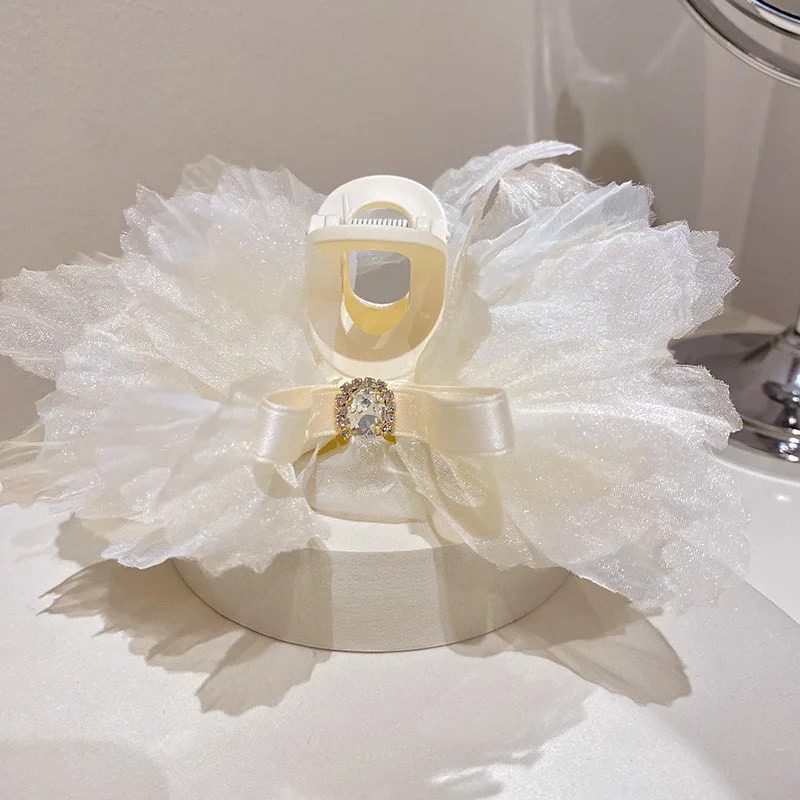 South Korea's exaggerated new diamond lace bow catching hair shark clip hairpin net red temperament hair accessories women
South Korea's exaggerated new diamond lace bow catching hair shark clip hairpin net red temperament hair accessories women