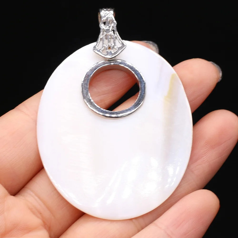 Natural White Shell Pendant Fashion Big Hole Egg Shape Pendant Charms for Making Jewelry Necklace Accessories Gift 45x55mm
Natural White Shell Pendant Fashion Big Hole Egg Shape Pendant Charms for Making Jewelry Necklace Accessories Gift 45x55mm