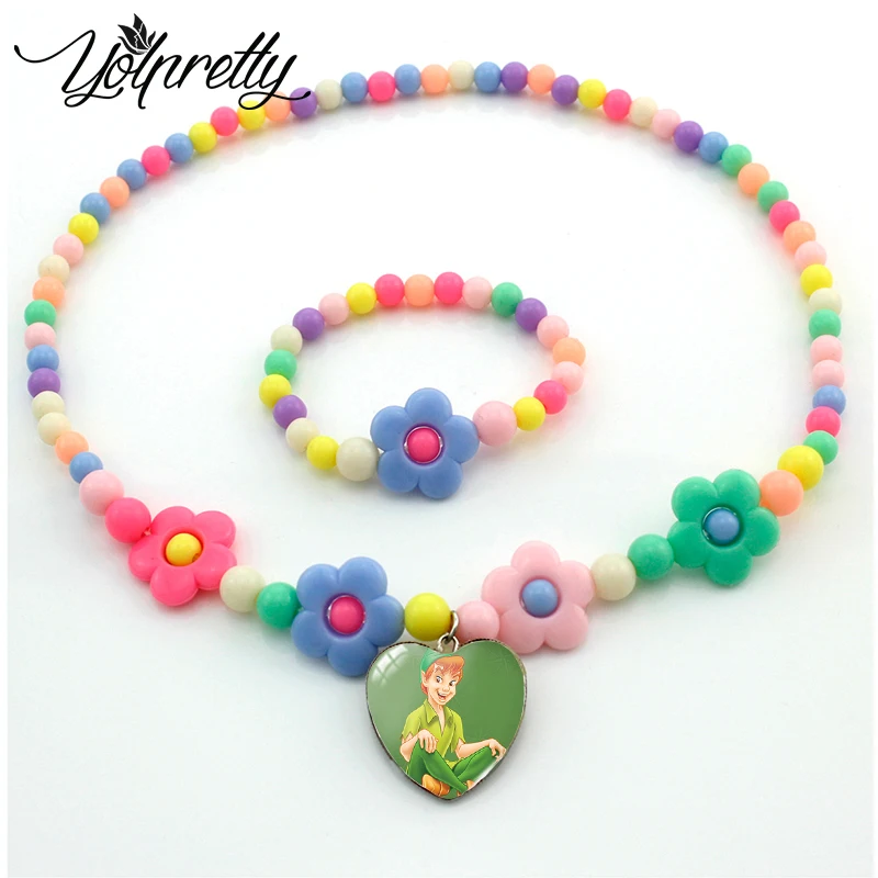 Детское ожерелье Питер Пэн, стеклянный кулон в виде сказочного цветка, звезды, сердца с кабошоном, подарочное ювелирное изделие
Детское ожерелье Питер Пэн, стеклянный кулон в виде сказочного цветка, звезды, сердца с кабошоном, подарочное ювелирное изделие