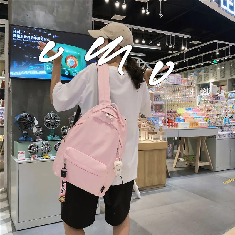 Customize your picture Korean style style nylon solid color backpack Simple casual rabbit pendant backpack
Customize your picture Korean style style nylon solid color backpack Simple casual rabbit pendant backpack