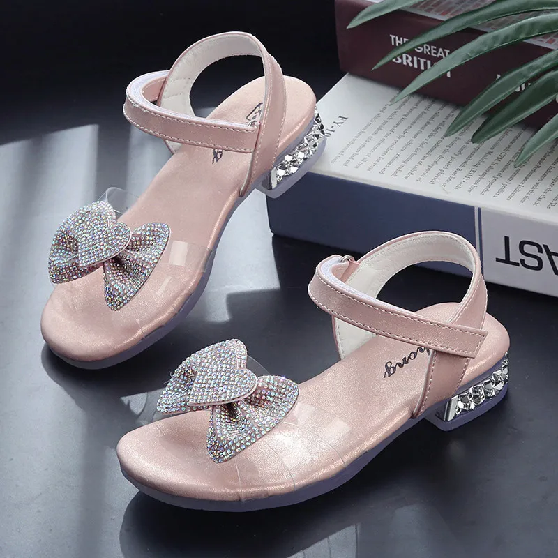 Children's sandals 2021 new summer girl fashion bow princess shoes little girl sweet water drill soft-soled shoes
Children's sandals 2021 new summer girl fashion bow princess shoes little girl sweet water drill soft-soled shoes