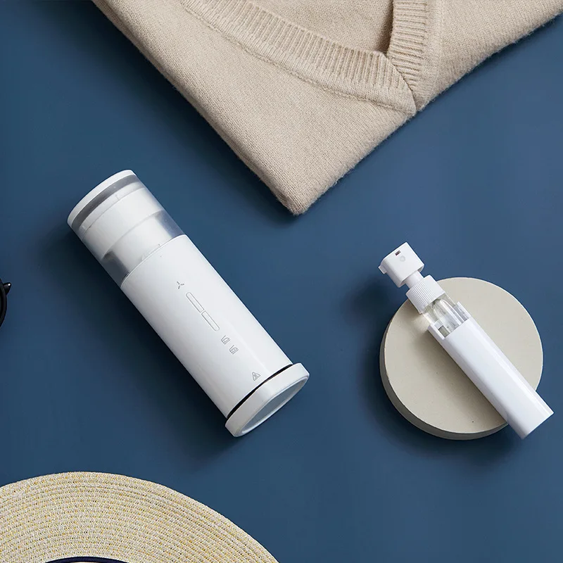 Portable electric iron handheld small home ironing machine to remove the hair ball trimmer ironing clothes
Portable electric iron handheld small home ironing machine to remove the hair ball trimmer ironing clothes