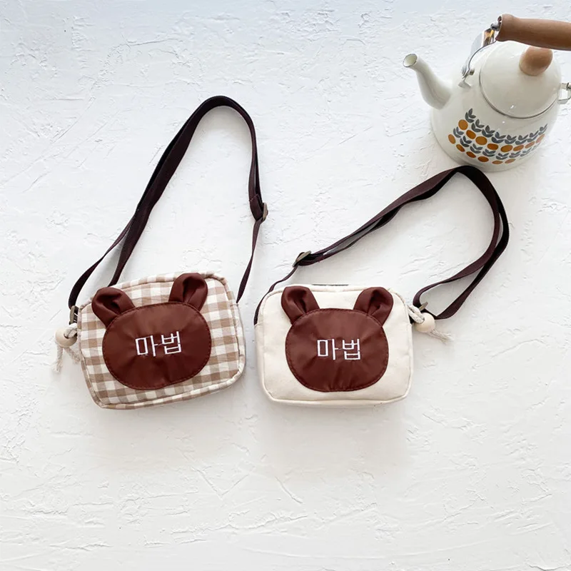 Korean plaid baby bear baby travel messenger bag, children's cute cartoon shoulder bag, boy and girl coin purse birthday gift
Korean plaid baby bear baby travel messenger bag, children's cute cartoon shoulder bag, boy and girl coin purse birthday gift