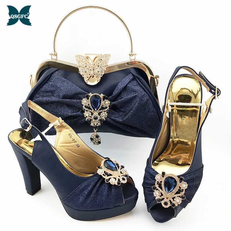 2020 Newest Dark Blue Fashion Wedding Shoes And Bag Set Latest Italian Style Women Pumps Shoes And Bag To Match Set For Party
2020 Newest Dark Blue Fashion Wedding Shoes And Bag Set Latest Italian Style Women Pumps Shoes And Bag To Match Set For Party