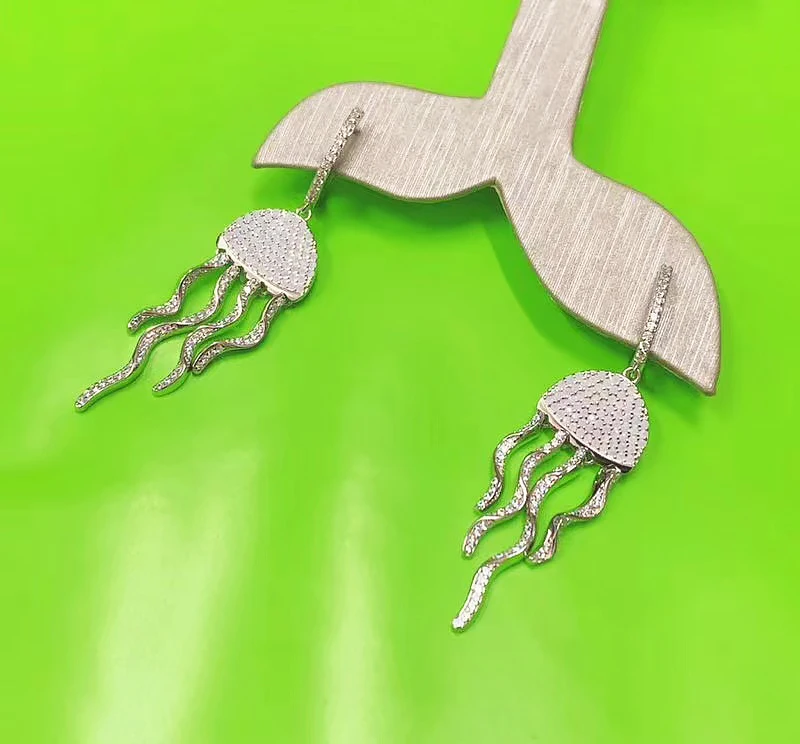 Jellyfish tassel long earrings single 925 Sterling Silver micro inlaid zircon exquisite fashion elegant high-end women's model
Jellyfish tassel long earrings single 925 Sterling Silver micro inlaid zircon exquisite fashion elegant high-end women's model