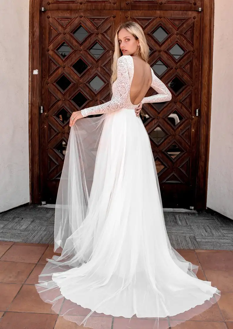 Summer Beach Wedding Dress 2021 robe de marie Sexy Backless Lace Wedding Gowns Elegant A Line Long Sleeve Bridal Dresses 
Summer Beach Wedding Dress 2021 robe de marie Sexy Backless Lace Wedding Gowns Elegant A Line Long Sleeve Bridal Dresses