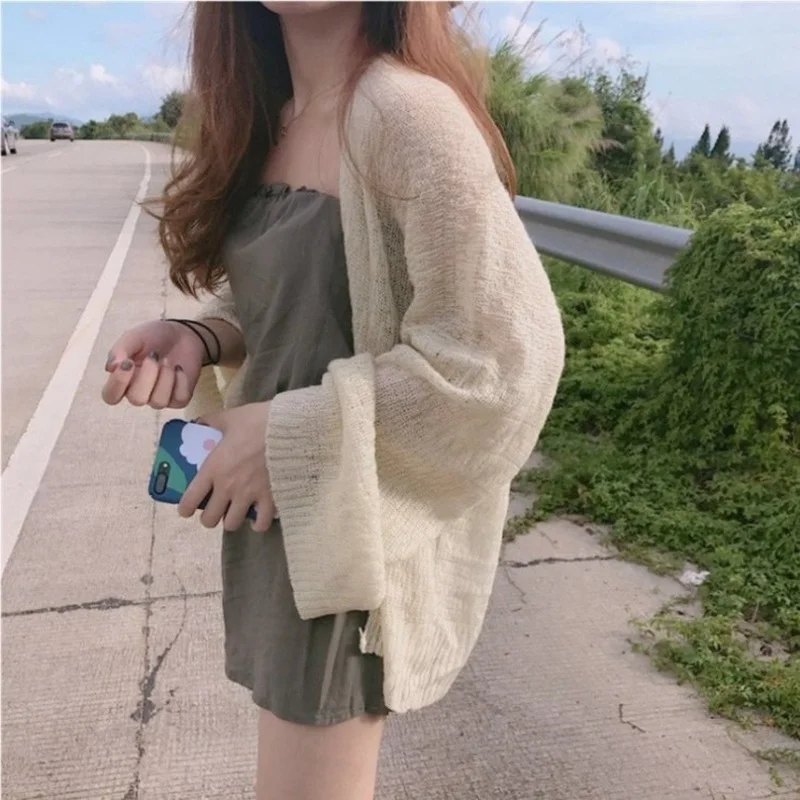 Knitted Sweater 2021 Spring/Summer Thin Jacket Womens Sun Protection Clothes Loose Vintage Beach Outer Wear Shawls
Knitted Sweater 2021 Spring/Summer Thin Jacket Womens Sun Protection Clothes Loose Vintage Beach Outer Wear Shawls