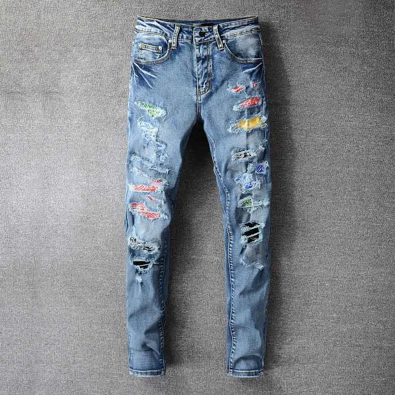 Fashion Men High Street Ripped Jeans Pants Slim Blue Color Streetwear Denim Trousers For Male With Holes Patches 
Fashion Men High Street Ripped Jeans Pants Slim Blue Color Streetwear Denim Trousers For Male With Holes Patches