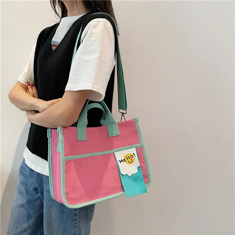 Women Handbag Large Capacity Shoulder Bags Causal Canvas Bag Color Contrast Female New Fashion Tote Messenger Bag 2021
Women Handbag Large Capacity Shoulder Bags Causal Canvas Bag Color Contrast Female New Fashion Tote Messenger Bag 2021