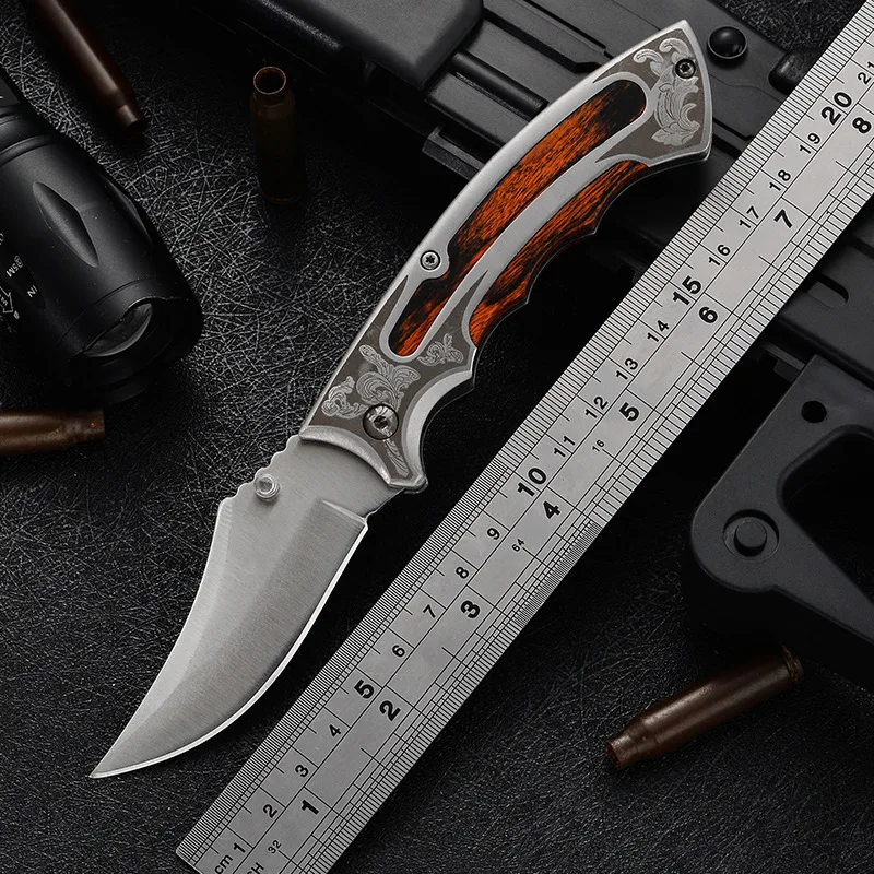 Stainless steel laser pattern color wood handle high hardness small folding knife camping survival knife portable folding knife
Stainless steel laser pattern color wood handle high hardness small folding knife camping survival knife portable folding knife