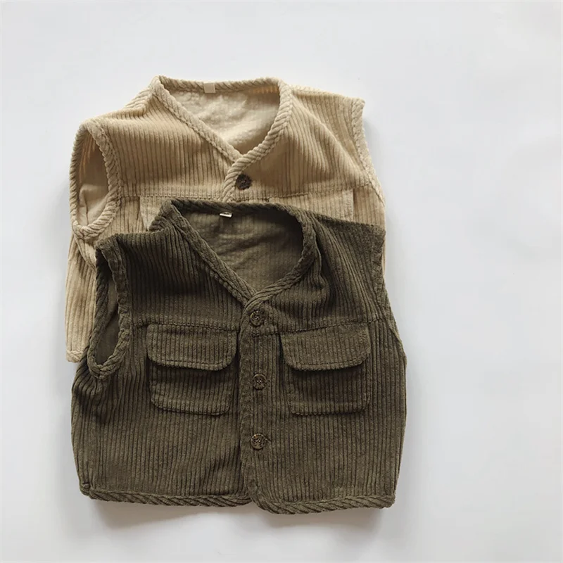 Fall Korean style Boys and girls Corduroy Pockets Sleeveless Vest Tops Children Solid Color Soft Loose Waistcoats
Fall Korean style Boys and girls Corduroy Pockets Sleeveless Vest Tops Children Solid Color Soft Loose Waistcoats