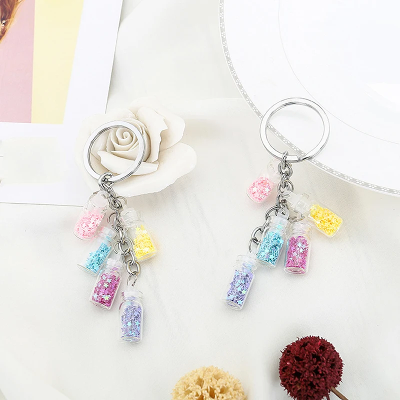 Colorized Shining Star Drift Bottle Keychain 5 Glass Bottle Keyrings For Lover Gifts Key Chain For Car Bags Key Decor Accessory
Colorized Shining Star Drift Bottle Keychain 5 Glass Bottle Keyrings For Lover Gifts Key Chain For Car Bags Key Decor Accessory