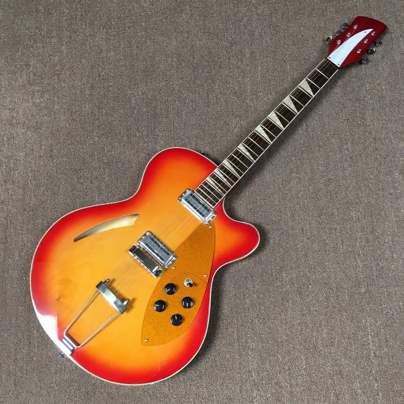 Ricken Electric Guitar 6 String Rosewood fingerboard Trapeze Tailpiece Cherry Sunburst Gloss Finish IN STOCK Fast Shipping
Ricken Electric Guitar 6 String Rosewood fingerboard Trapeze Tailpiece Cherry Sunburst Gloss Finish IN STOCK Fast Shipping