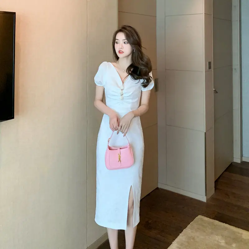 Женское винтажное платье-карандаш с V-образным вырезом и разрезом 
Женское винтажное платье-карандаш с V-образным вырезом и разрезом