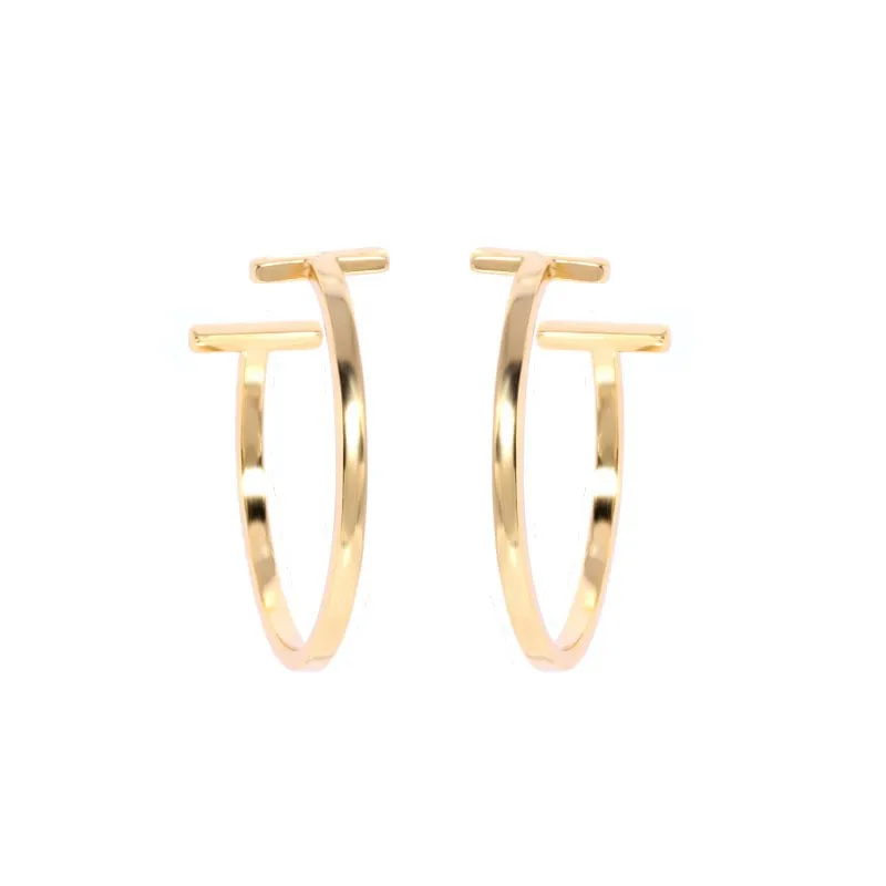1:1 S925 Women's Sterling Silver Stud Earrings Popular T1 Series Round Stud Earrings Female All-Match Personalized Jewelry 
1:1 S925 Women's Sterling Silver Stud Earrings Popular T1 Series Round Stud Earrings Female All-Match Personalized Jewelry