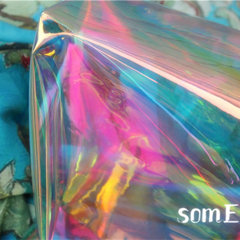 0.4mm Iridescent TPU Fabric Laser PVC Rainbow Fluorescent Waterproof DIY Arts Decor Bags Plastic Coat Clothes Designer Fabric
0.4mm Iridescent TPU Fabric Laser PVC Rainbow Fluorescent Waterproof DIY Arts Decor Bags Plastic Coat Clothes Designer Fabric
