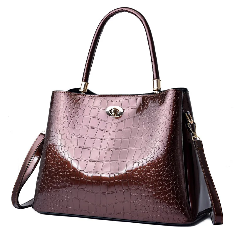 Women's 2021 new child bag European and American retro PU crocodile portable patent leather shoulder messenger bag
Women's 2021 new child bag European and American retro PU crocodile portable patent leather shoulder messenger bag