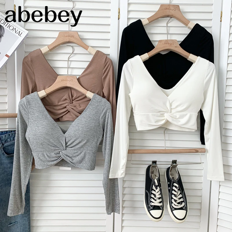 Temperament V-Neck long sleeve T-Shirt cross kink design high waist pleated solid color short T-Shirt Top 2021 New Spring Autumn
Temperament V-Neck long sleeve T-Shirt cross kink design high waist pleated solid color short T-Shirt Top 2021 New Spring Autumn