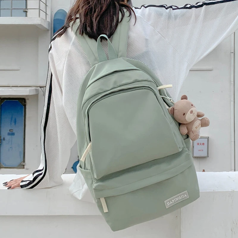 EST Waterproof Nylon Backpack Solid Color Large School Bag Kawaii Pendant Travel Women Shoulders Rucksack Bolsa Mochila Mejure
EST Waterproof Nylon Backpack Solid Color Large School Bag Kawaii Pendant Travel Women Shoulders Rucksack Bolsa Mochila Mejure