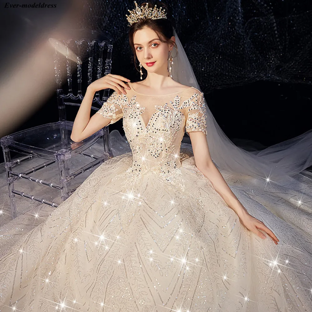 Off Shoulder Shiny Long Train Wedding Dress Short Sleeve Lace-up Back Sequins Bridal Gowns Bridal Dress vestidos de novia 2020
Off Shoulder Shiny Long Train Wedding Dress Short Sleeve Lace-up Back Sequins Bridal Gowns Bridal Dress vestidos de novia 2020