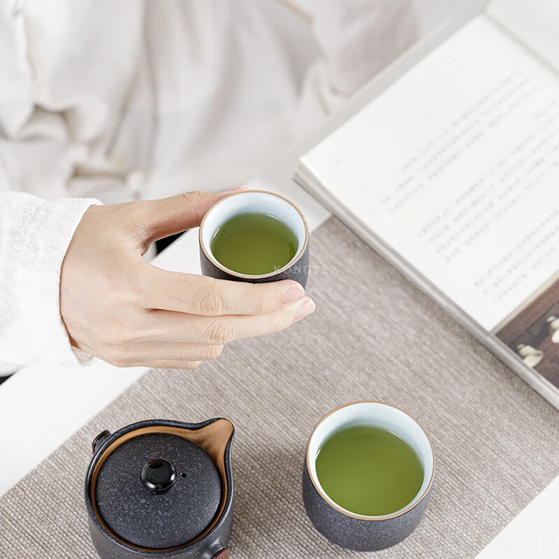 Portable Travel Tea Set Quick Cup Japanese Ceramic One Pot Two Cups Portable Bag Carrying Outdoor Office Teapot Kung Fu Tea Set
Portable Travel Tea Set Quick Cup Japanese Ceramic One Pot Two Cups Portable Bag Carrying Outdoor Office Teapot Kung Fu Tea Set