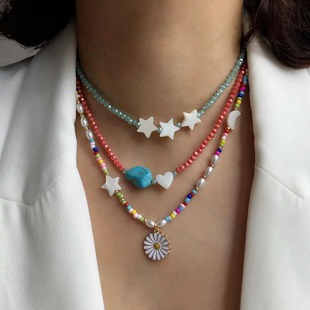 Small daisy pendant color rice bead necklace for female with wild turquoise crystal clavicle chain jewelry
Small daisy pendant color rice bead necklace for female with wild turquoise crystal clavicle chain jewelry