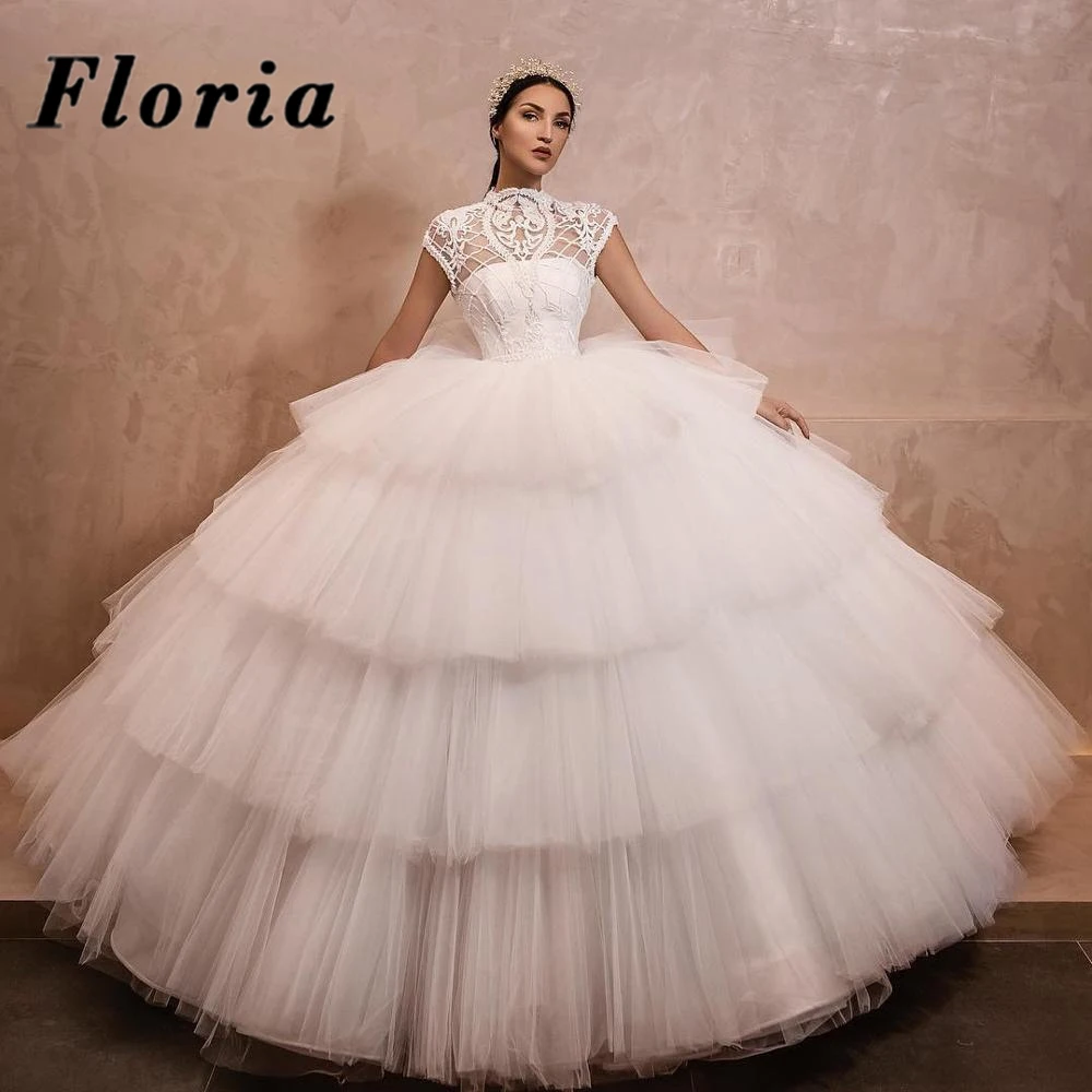 White Beaded Lace Wedding Brides Dresses 2020 New Arrival свадебные платья Tiered Capped Short Sleeves Bridal Long Gowns Arabic
White Beaded Lace Wedding Brides Dresses 2020 New Arrival свадебные платья Tiered Capped Short Sleeves Bridal Long Gowns Arabic