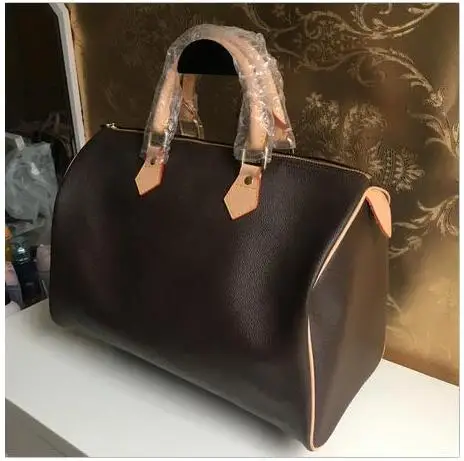 Woxk fashion new good quality women's Handbag Polyurethane speedy bag 30/35cm Free shipping
Woxk fashion new good quality women's Handbag Polyurethane speedy bag 30/35cm Free shipping