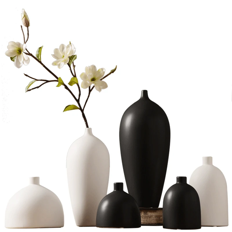 Classic black / white ceramic vase Creative tabletop small vase Dried flowers container home decoration modern texture vases
Classic black / white ceramic vase Creative tabletop small vase Dried flowers container home decoration modern texture vases