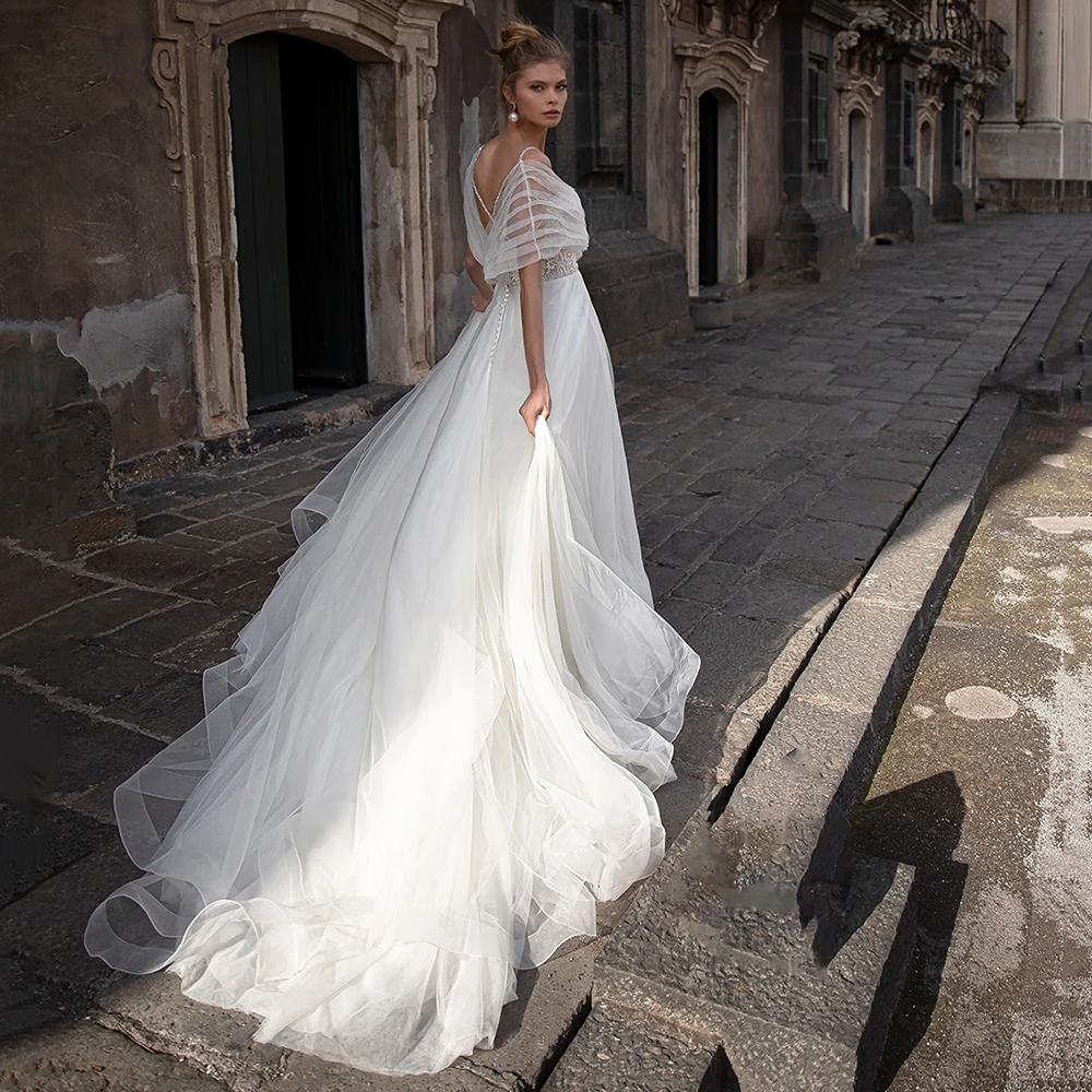 UZN Gorgeous Ivory A-Line Sweetheart Spagetti Beading Straps Wedding Dress Elegant Pleated Off The Shoulder Short Sleeves Bridal
UZN Gorgeous Ivory A-Line Sweetheart Spagetti Beading Straps Wedding Dress Elegant Pleated Off The Shoulder Short Sleeves Bridal
