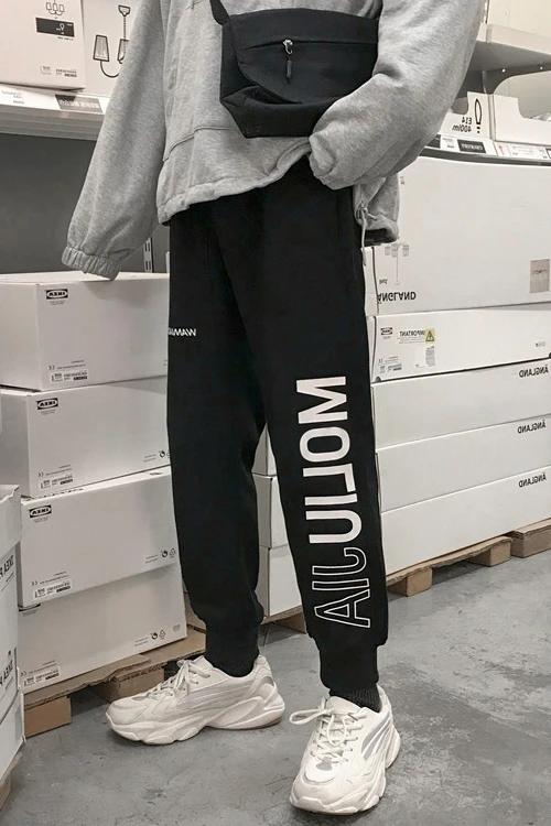 M-5XL!Oversized guard pants men's tide brand wild letter printing graffiti loose 9 points casual pants beam foot pants. 
M-5XL!Oversized guard pants men's tide brand wild letter printing graffiti loose 9 points casual pants beam foot pants.