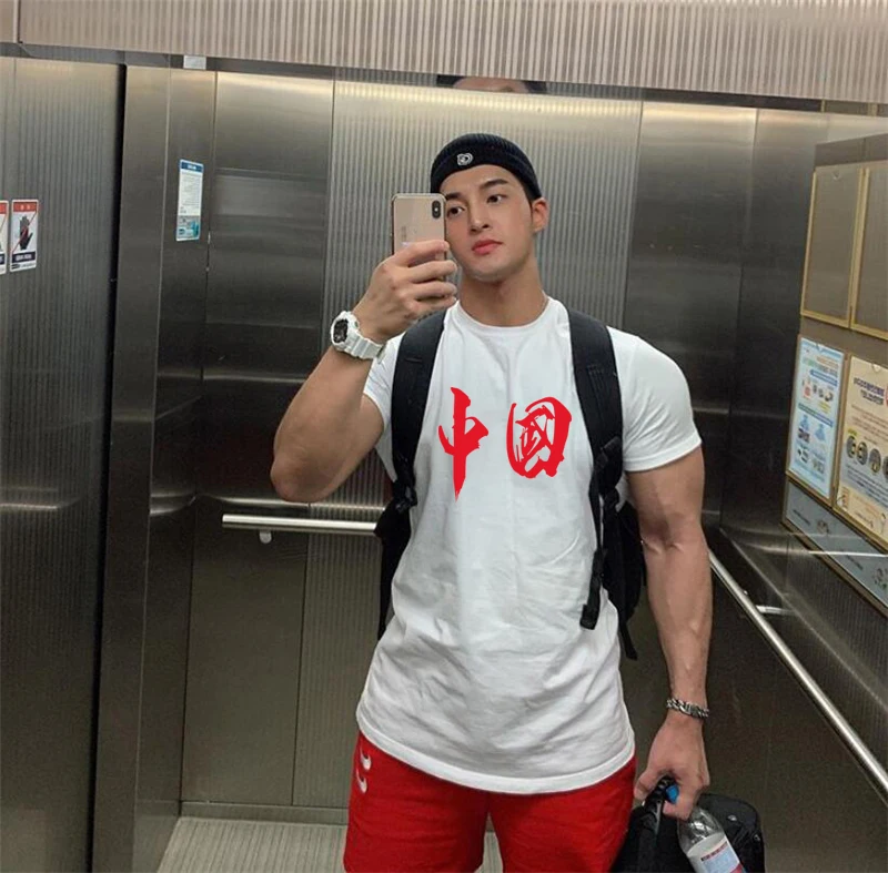 Brand Men's Summer Cotton Fashion Extend Hip Hop Trend Print Tops Muscle Gyms Clothing Bodybuilding Fitness Short Sleeve T-shirt 
Brand Men's Summer Cotton Fashion Extend Hip Hop Trend Print Tops Muscle Gyms Clothing Bodybuilding Fitness Short Sleeve T-shirt