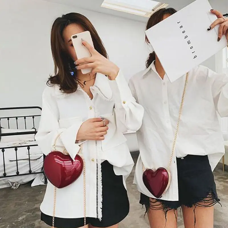 2020 Mini Heart bag Summer Fashion New Quality Patent Leather Women's Designer Handbag Luxury brand Chain Shoulder Messenger Bag
2020 Mini Heart bag Summer Fashion New Quality Patent Leather Women's Designer Handbag Luxury brand Chain Shoulder Messenger Bag