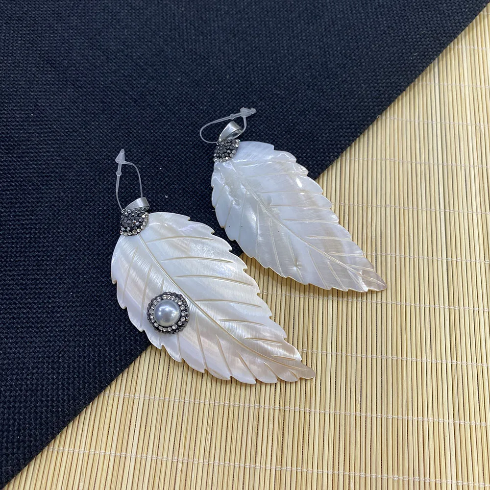 Natural Freshwater Shell Leaf-shaped Pendant Fashionable Charm Necklace and Bracelet DIY Handmade Size 30x40mm
Natural Freshwater Shell Leaf-shaped Pendant Fashionable Charm Necklace and Bracelet DIY Handmade Size 30x40mm