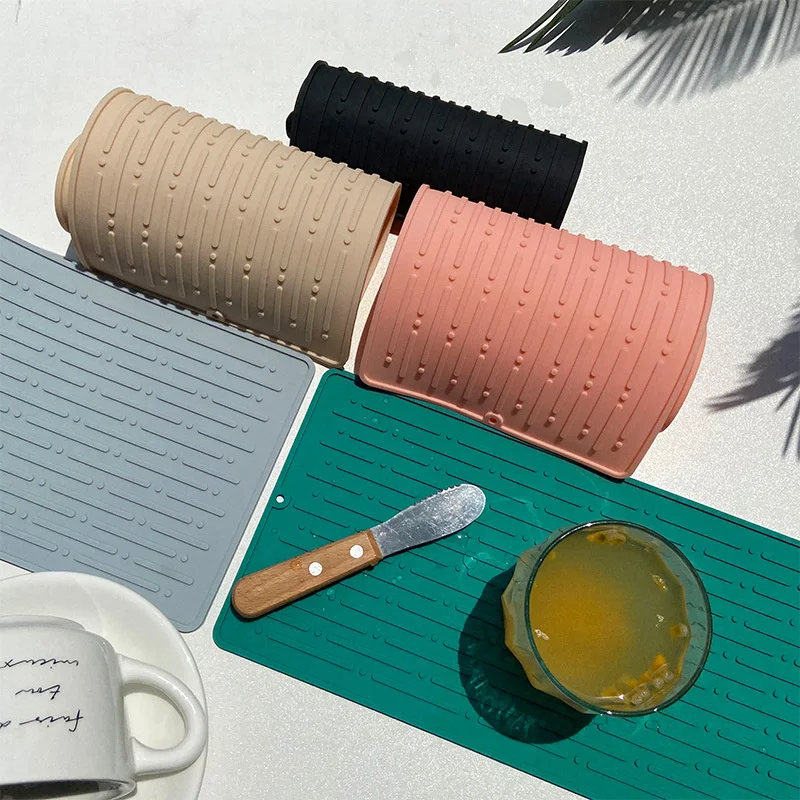 Kitchen Drain Mat Silicon Gel Meal Pad Dinner Plate Large Filter Pad Cutting Board Anti Slip Pad Anti Scald Pot Coaster
Kitchen Drain Mat Silicon Gel Meal Pad Dinner Plate Large Filter Pad Cutting Board Anti Slip Pad Anti Scald Pot Coaster