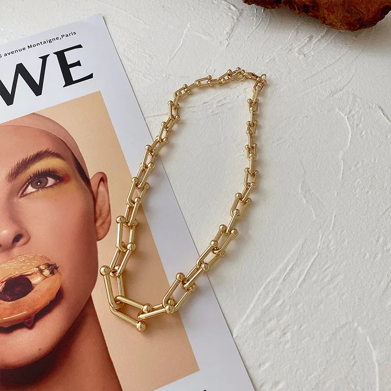 Ожерелье из толстой металлической цепи из желтого золота 18 К для женщин модная цепочка до ключиц золотое ожерелье на День святого Валентина...
Ожерелье из толстой металлической цепи из желтого золота 18 К для женщин модная цепочка до ключиц золотое ожерелье на День святого Валентина...