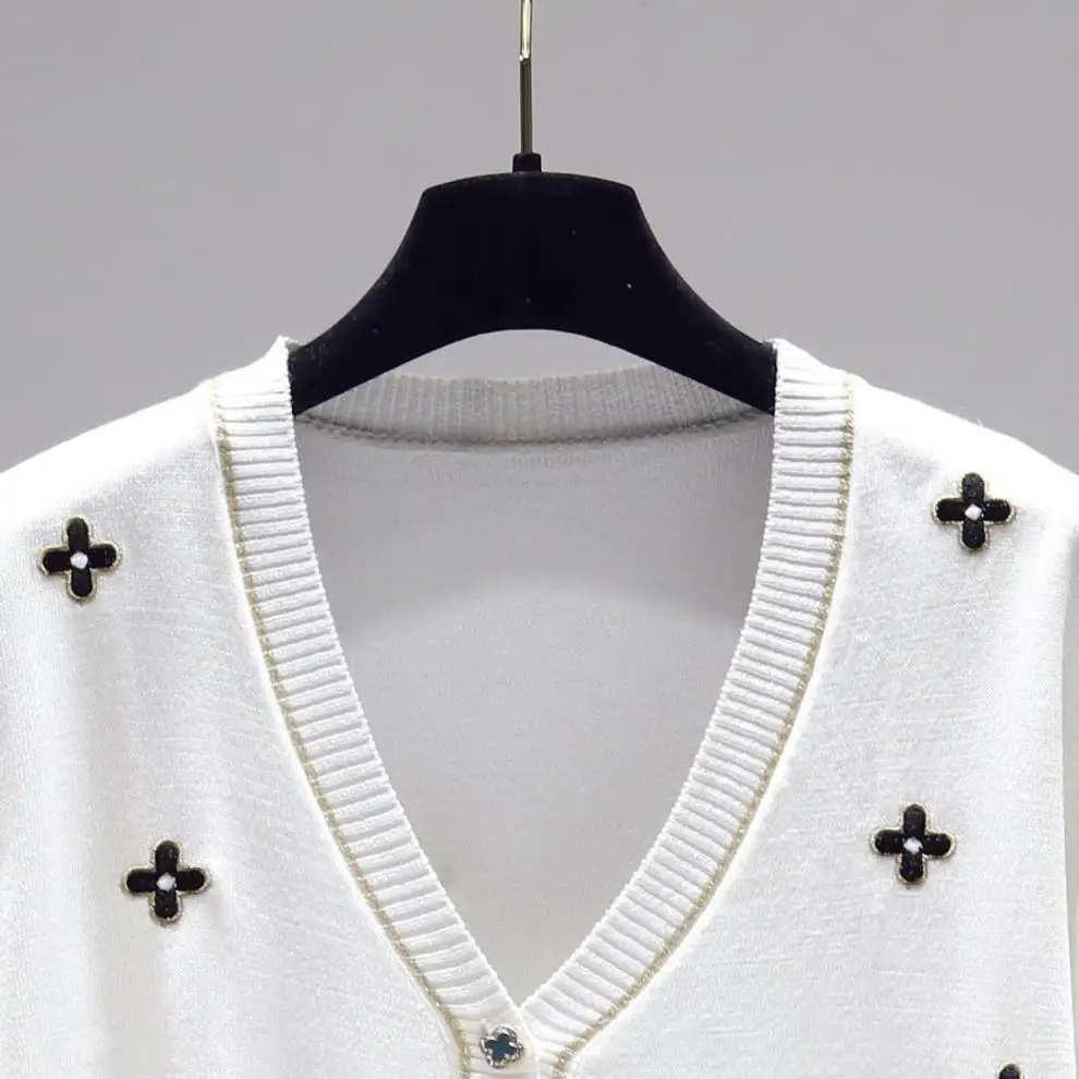 French retro 2021 spring and summer new loose short sleeve ice silk knitted cardigan sweater coat women's fashion
French retro 2021 spring and summer new loose short sleeve ice silk knitted cardigan sweater coat women's fashion