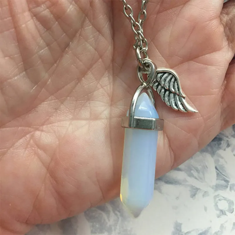 Natural Crystal Stone Hexagonal Prism Pendants Double Pointed Antique Silver Color Feather Quartz Pendant for Necklace
Natural Crystal Stone Hexagonal Prism Pendants Double Pointed Antique Silver Color Feather Quartz Pendant for Necklace
