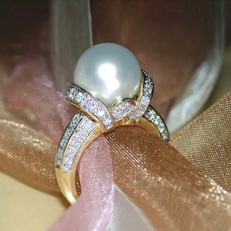Big Pearl Gold Ring with Bling ZIrcon Ston for Women Fashion Trend Jewelry Wedding Engagement Ring 2021
Big Pearl Gold Ring with Bling ZIrcon Ston for Women Fashion Trend Jewelry Wedding Engagement Ring 2021