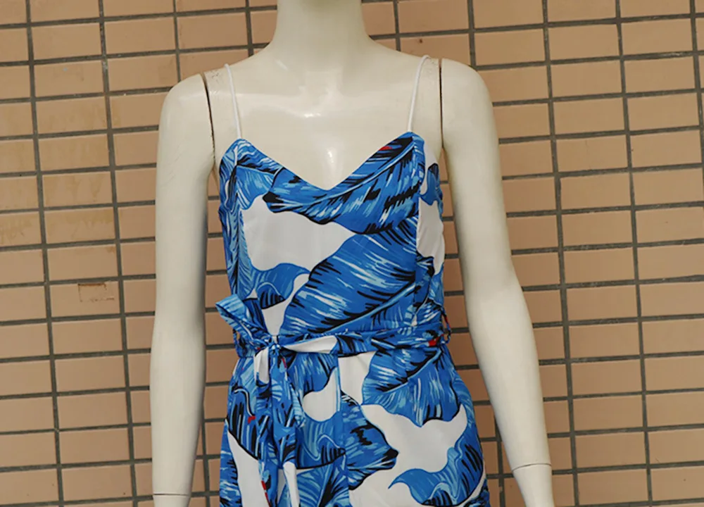 V-neck sexy sling print split jumpsuit women's clothing
V-neck sexy sling print split jumpsuit women's clothing