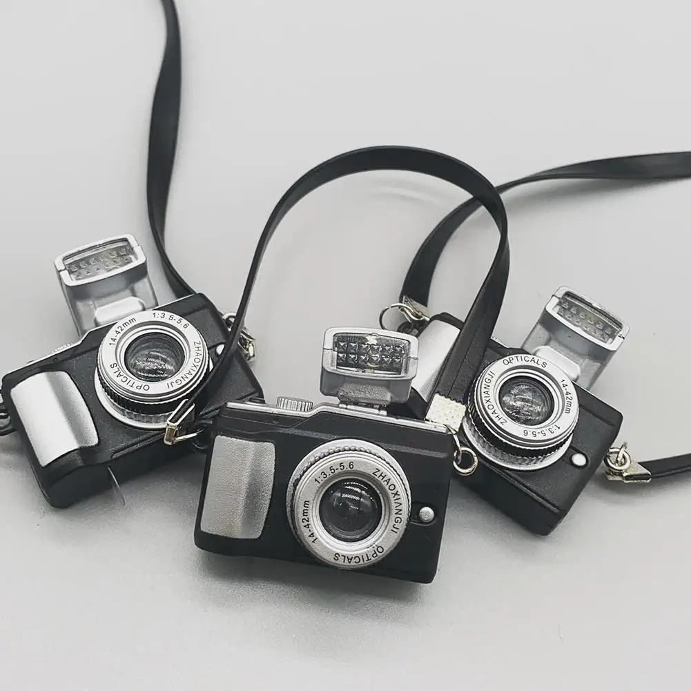 Кукольные игрушки камера Мини имитация камеры s для украшения кукольного дома аксессуар S1D9
Кукольные игрушки камера Мини имитация камеры s для украшения кукольного дома аксессуар S1D9