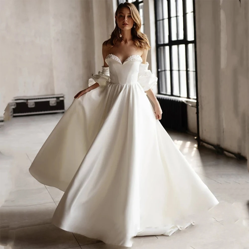 Three Quarter Sleeves Weddding Dresses 2021 Elegant Sweetheart Backless Satin A Line Court Train Bridal Gowns Robe De Mariée
Three Quarter Sleeves Weddding Dresses 2021 Elegant Sweetheart Backless Satin A Line Court Train Bridal Gowns Robe De Mariée