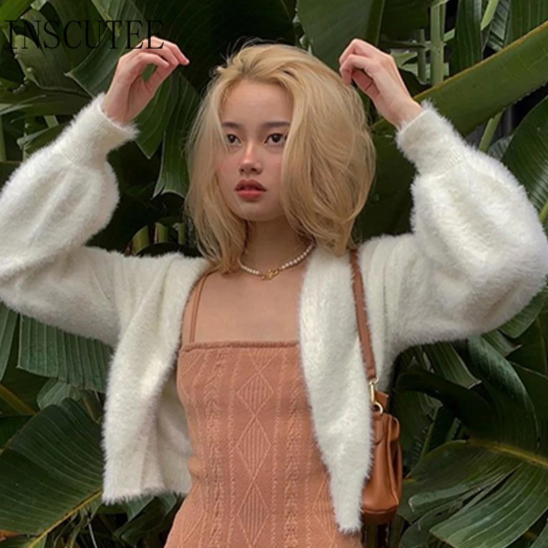 Inscutee 2021 Autumn Casual Loose White Knitted Cardigan Women Y2K Harajuku Sweaters Fashion Split Lantern Long Sleeve Knitwear
Inscutee 2021 Autumn Casual Loose White Knitted Cardigan Women Y2K Harajuku Sweaters Fashion Split Lantern Long Sleeve Knitwear