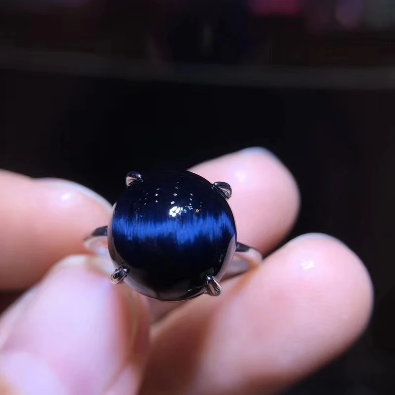 Женское кольцо с кристаллом AAAAA, регулируемое круглое кольцо с натуральным синим драгоценным камнем кошачий глаз, 12x11 мм, из серебра 925 пробы
Женское кольцо с кристаллом AAAAA, регулируемое круглое кольцо с натуральным синим драгоценным камнем кошачий глаз, 12x11 мм, из серебра 925 пробы