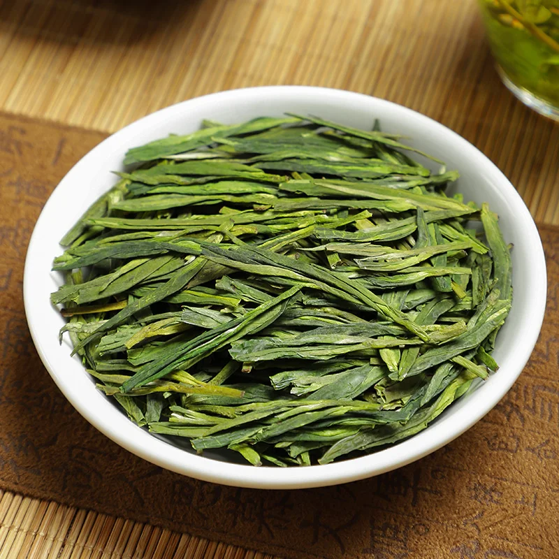 Famous Good quality Dragon Well Chinese Tea the Chinese Green Tea West Lake Dragon Well Health Care 
Famous Good quality Dragon Well Chinese Tea the Chinese Green Tea West Lake Dragon Well Health Care