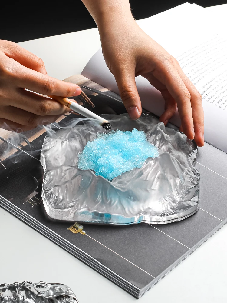 Glass ashtray creative personality trend home living room fashion fly ash proof office decoration ashtray 
Glass ashtray creative personality trend home living room fashion fly ash proof office decoration ashtray