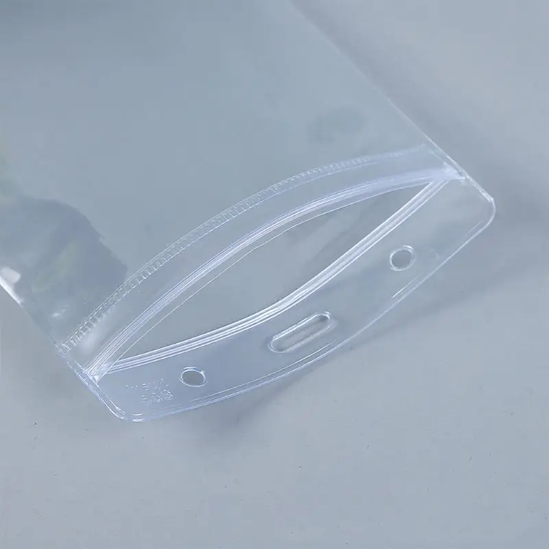 Упаковка из 100 прозрачных пластиковых вертикальных держателей для значков, держателей для бирок с именем, держателей карт 
Упаковка из 100 прозрачных пластиковых вертикальных держателей для значков, держателей для бирок с именем, держателей карт